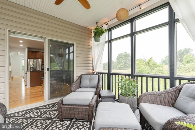 189 Potomac Crossing St, Charles Town, WV 25414 - sunroom / solarium featuring a ceiling fan and arched walkways