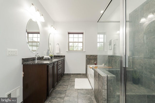 189 Potomac Crossing St, Charles Town, WV 25414 - full bathroom with double vanity, a bath, and a shower with shower door