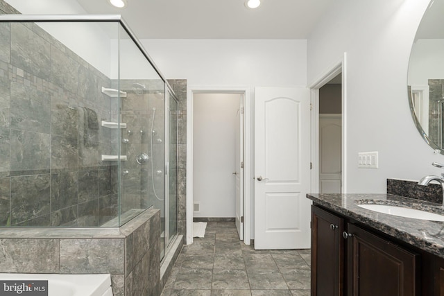 189 Potomac Crossing St, Charles Town, WV 25414 - bathroom with a shower stall, vanity, recessed lighting, and a bath