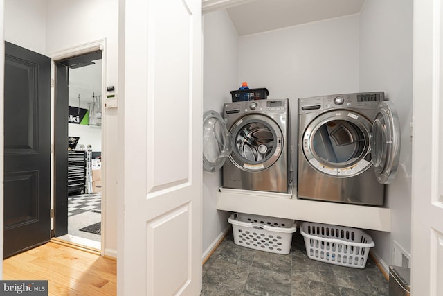 189 Potomac Crossing St, Charles Town, WV 25414 - laundry room with washing machine and clothes dryer and baseboards