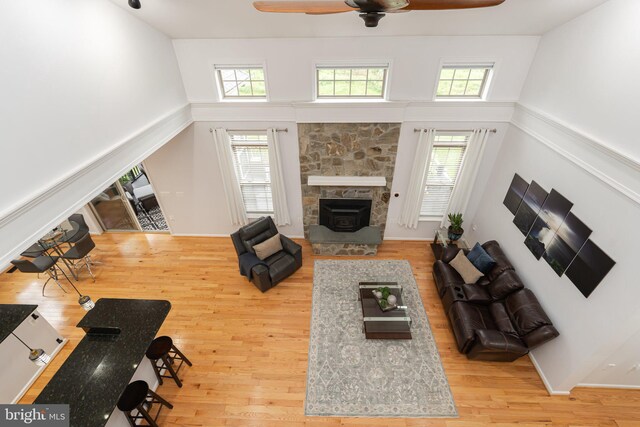 189 Potomac Crossing St, Charles Town, WV 25414 - living area with a high ceiling, a ceiling fan, wood finished floors, and healthy amount of natural light