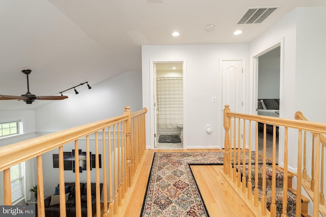 189 Potomac Crossing St, Charles Town, WV 25414 - corridor with light wood-style flooring, an upstairs landing, track lighting, recessed lighting, and baseboards