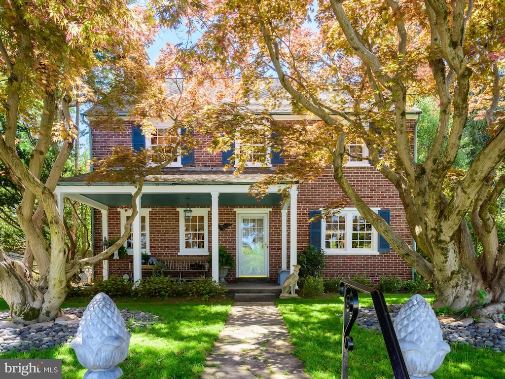 27 Dogwood Dr, Kennett Square, PA 19348 - view of front of home featuring brick siding and a front lawn