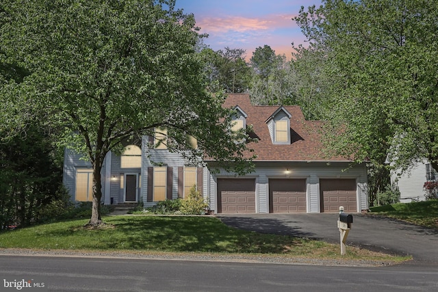 24 Monument Dr, Stafford, VA 22554 - view of front of home with a yard and aphalt driveway