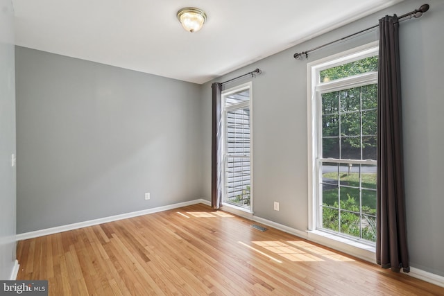 24 Monument Dr, Stafford, VA 22554 - empty room with baseboards, visible vents, and light wood-type flooring