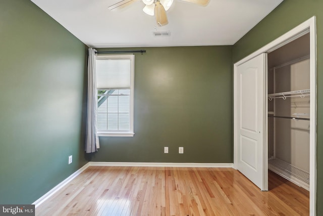 24 Monument Dr, Stafford, VA 22554 - unfurnished bedroom featuring a ceiling fan, baseboards, light wood-style flooring, and a closet