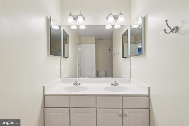 24 Monument Dr, Stafford, VA 22554 - bathroom featuring double vanity and a sink
