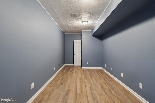 24 Monument Dr, Stafford, VA 22554 - spare room with baseboards, visible vents, and wood finished floors