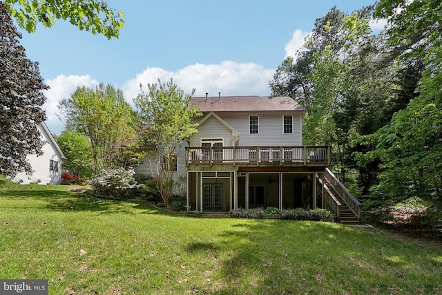 24 Monument Dr, Stafford, VA 22554 - back of house with a lawn, stairway, and a deck