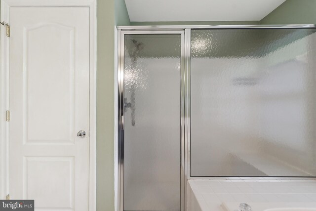 24 Monument Dr, Stafford, VA 22554 - bathroom featuring a bath and a shower stall