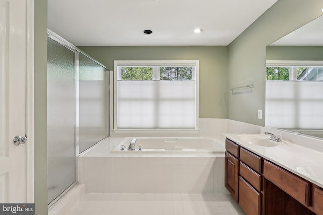 24 Monument Dr, Stafford, VA 22554 - bathroom featuring a stall shower, a bath, and a wealth of natural light