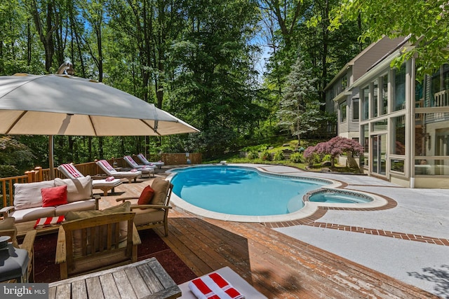 3 Hickory Ln, Chadds Ford, PA 19317 - view of pool with a wooden deck, a pool with connected hot tub, and view of scattered trees