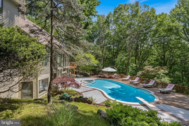 3 Hickory Ln, Chadds Ford, PA 19317 - view of pool featuring a diving board, a patio, fence, a pool with connected hot tub, and a wooden deck