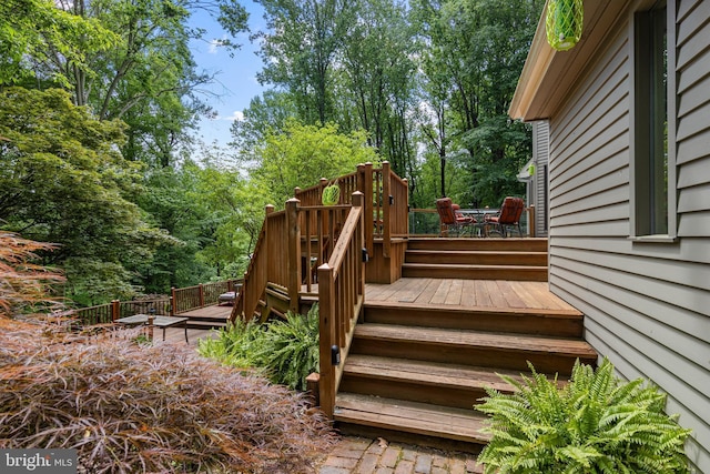3 Hickory Ln, Chadds Ford, PA 19317 - wooden terrace with outdoor dining area and view of scattered trees