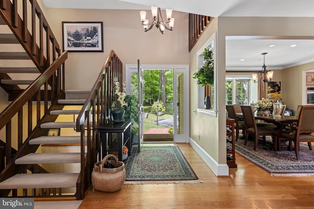 3 Hickory Ln, Chadds Ford, PA 19317 - foyer entrance featuring a chandelier, stairs, wood finished floors, baseboards, and recessed lighting