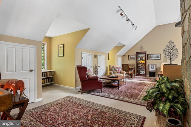 3 Hickory Ln, Chadds Ford, PA 19317 - carpeted living room featuring track lighting, lofted ceiling, and baseboards