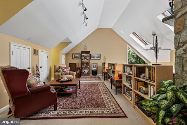 3 Hickory Ln, Chadds Ford, PA 19317 - sitting room with carpet flooring, track lighting, lofted ceiling, a ceiling fan, and a skylight