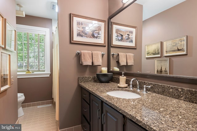 3 Hickory Ln, Chadds Ford, PA 19317 - bathroom featuring baseboards, vanity, toilet, and tile patterned floors