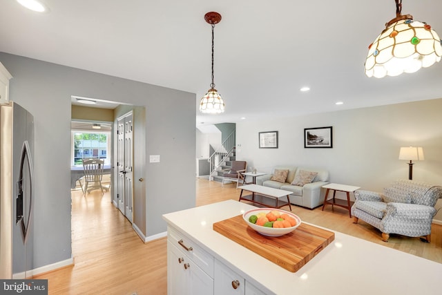 2314 Apple Hill Rd, Alexandria, VA 22308 - living room featuring light wood finished floors, stairs, recessed lighting, and baseboards