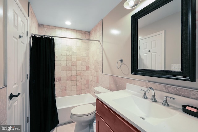 2314 Apple Hill Rd, Alexandria, VA 22308 - full bathroom featuring tile walls, vanity, tile patterned floors, shower / tub combo, and toilet