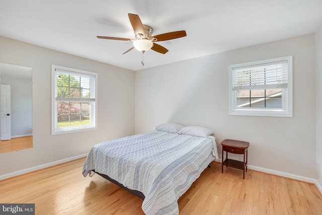 2314 Apple Hill Rd, Alexandria, VA 22308 - bedroom with light wood-type flooring, a ceiling fan, and baseboards