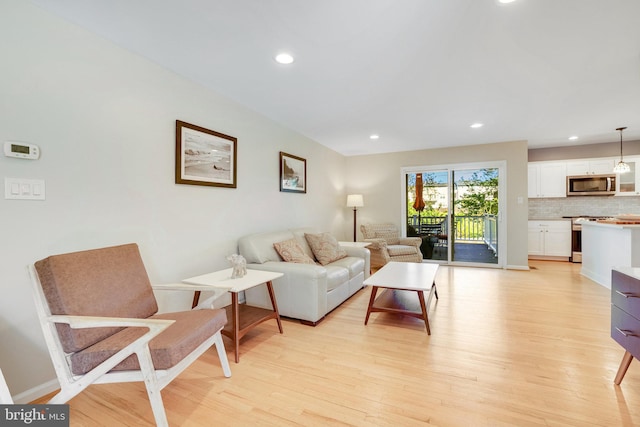 2314 Apple Hill Rd, Alexandria, VA 22308 - living room with recessed lighting and light wood-style floors