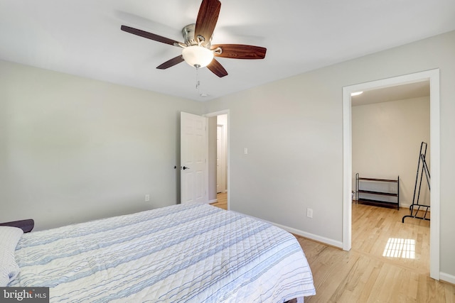 2314 Apple Hill Rd, Alexandria, VA 22308 - bedroom with a ceiling fan, light wood-style flooring, and baseboards