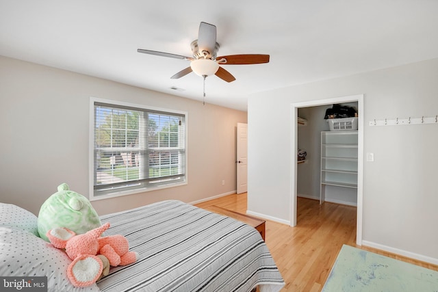 2314 Apple Hill Rd, Alexandria, VA 22308 - bedroom featuring light wood-style flooring, ceiling fan, visible vents, baseboards, and a spacious closet