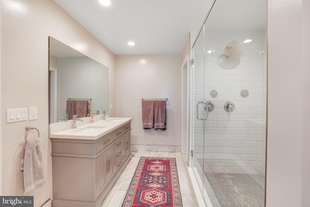 2314 Apple Hill Rd, Alexandria, VA 22308 - bathroom featuring recessed lighting, double vanity, a sink, and a shower stall