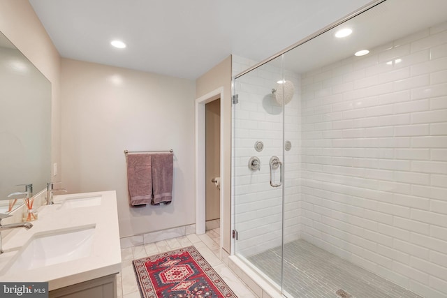 2314 Apple Hill Rd, Alexandria, VA 22308 - bathroom with a shower stall, recessed lighting, and a sink