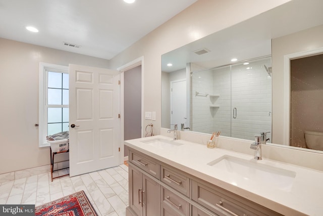 2314 Apple Hill Rd, Alexandria, VA 22308 - bathroom featuring double vanity, visible vents, a stall shower, and a sink