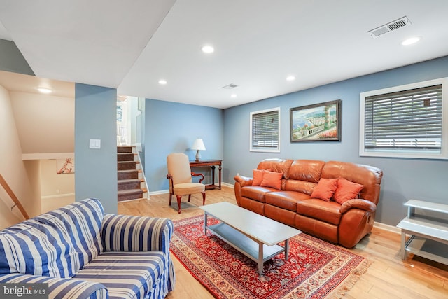 2314 Apple Hill Rd, Alexandria, VA 22308 - living room featuring wood finished floors, visible vents, recessed lighting, and stairs