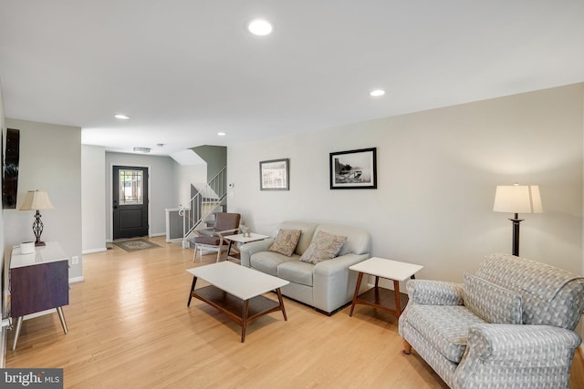 2314 Apple Hill Rd, Alexandria, VA 22308 - living room with light wood-type flooring, baseboards, recessed lighting, and stairs
