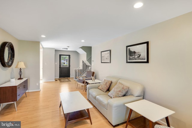 2314 Apple Hill Rd, Alexandria, VA 22308 - living area featuring recessed lighting, light wood finished floors, baseboards, and stairs
