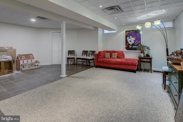 living area featuring recessed lighting, tile patterned flooring, visible vents, and baseboards