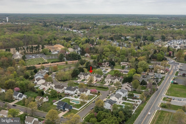 aerial view featuring a residential view and a forest view