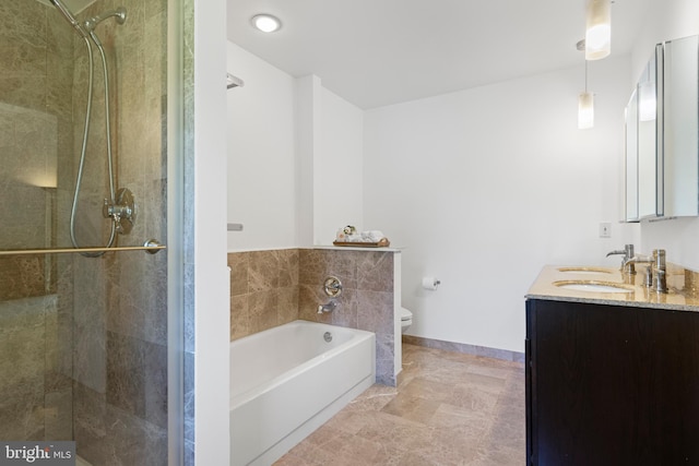 full bath with toilet, a garden tub, a stall shower, double vanity, and baseboards