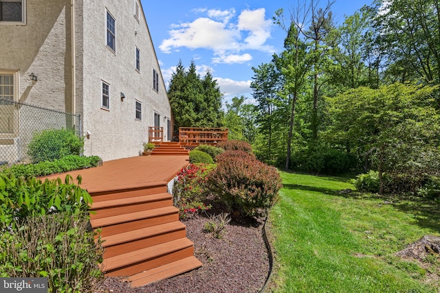 view of yard with a deck