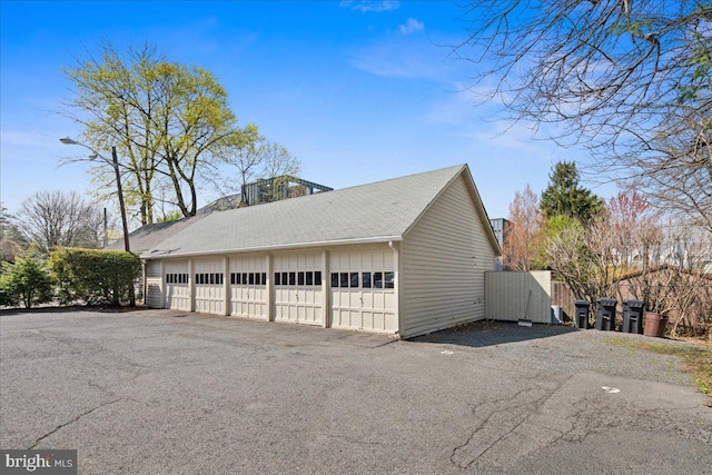 garage featuring fence
