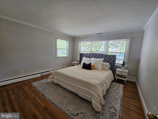 bedroom with crown molding, wood finished floors, baseboards, a baseboard radiator, and a baseboard heating unit
