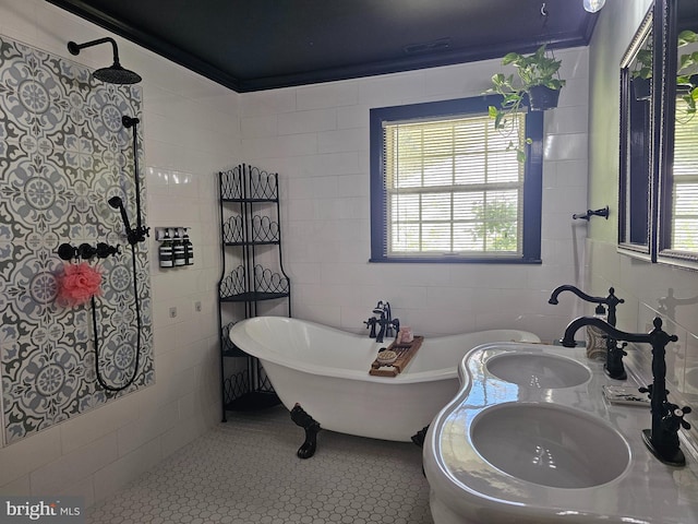 full bath featuring visible vents, a soaking tub, and tile walls