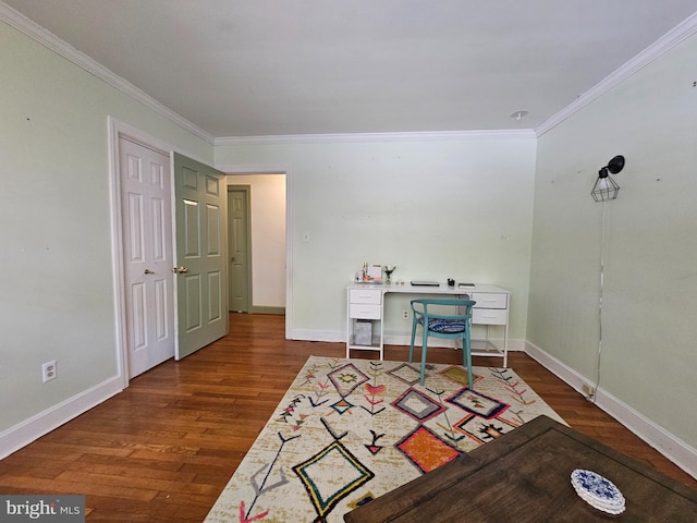 office space featuring crown molding, baseboards, and dark wood-style flooring