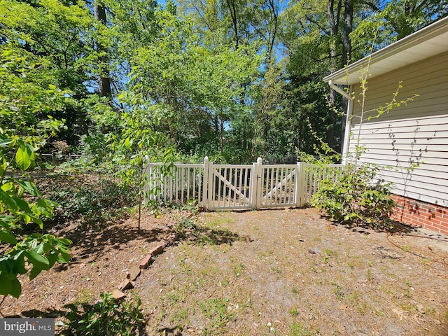 view of yard featuring fence