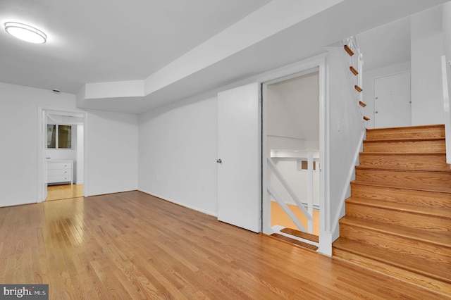 9235 E Parkhill Dr, Bethesda, MD 20814 - below grade area featuring light wood finished floors and stairs