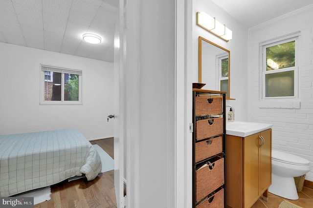 9235 E Parkhill Dr, Bethesda, MD 20814 - bathroom featuring vanity, toilet, and wood finished floors
