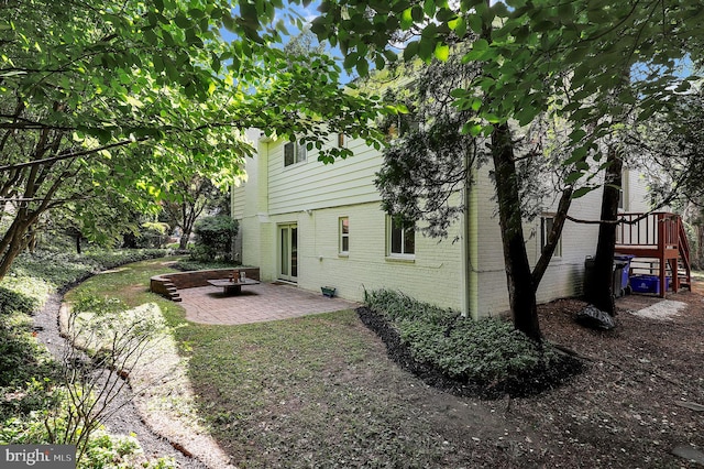 9235 E Parkhill Dr, Bethesda, MD 20814 - view of yard with a patio