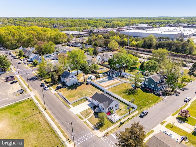 birds eye view of property with a residential view