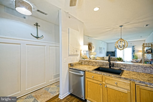 33192 N Village Loop Unit 5204, Lewes, DE 19958 - kitchen featuring a sink, dishwasher, a chandelier, and visible vents