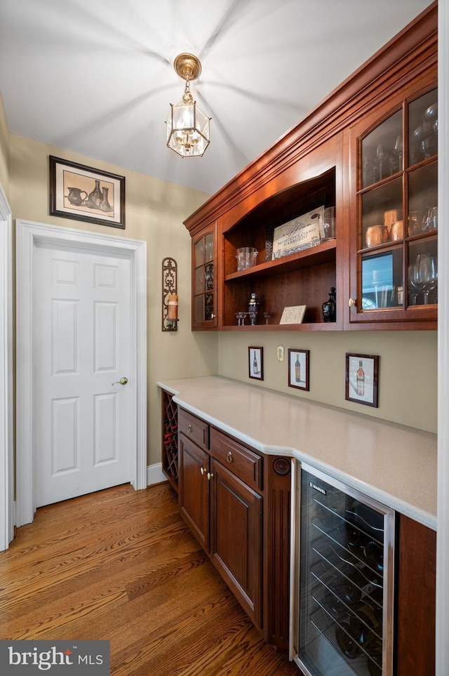 4064 Howell Rd, Malvern, PA 19355 - bar featuring baseboards, wood finished floors, and wine cooler