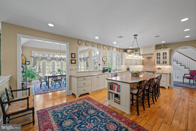 4064 Howell Rd, Malvern, PA 19355 - kitchen featuring light wood-type flooring, visible vents, a chandelier, and a kitchen bar